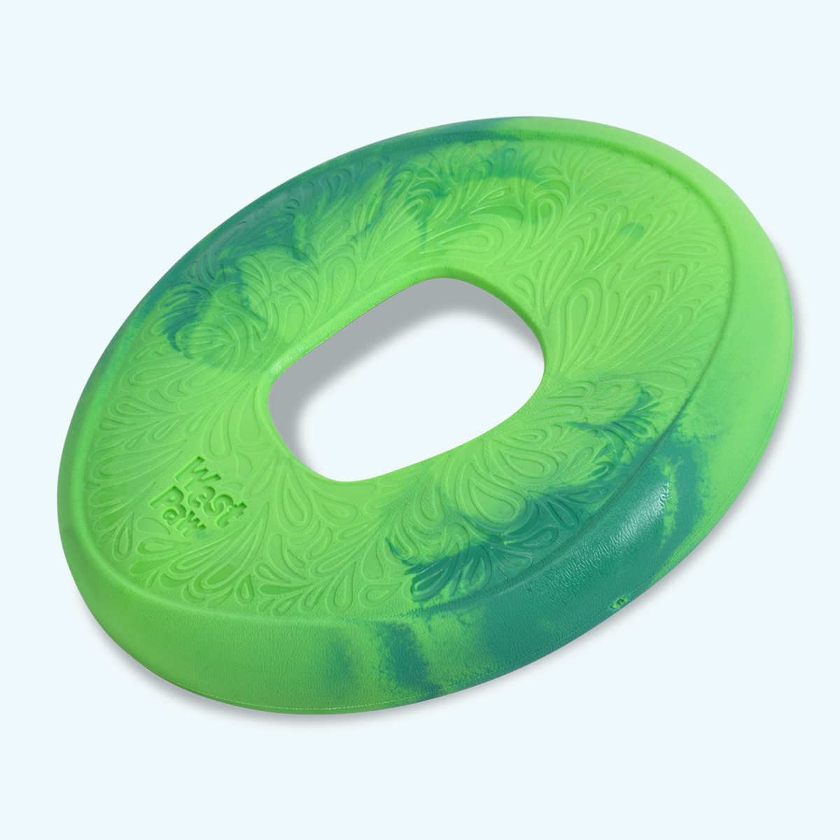 Green plastic object with embossed pattern on a light gray background