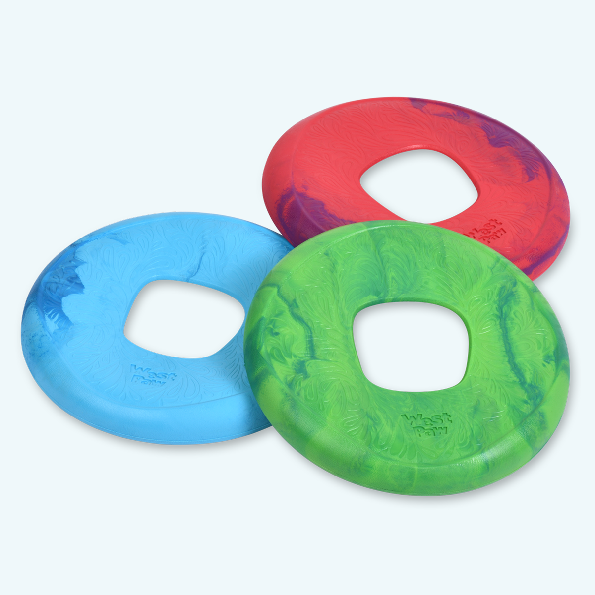 Three colorful rubber rings on a white background