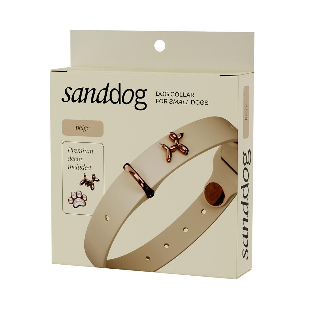 Beige dog collar packaging with sanddog branding on a white background
