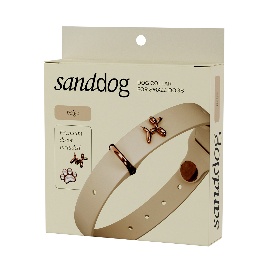 Beige dog collar packaging with sanddog branding on a white background