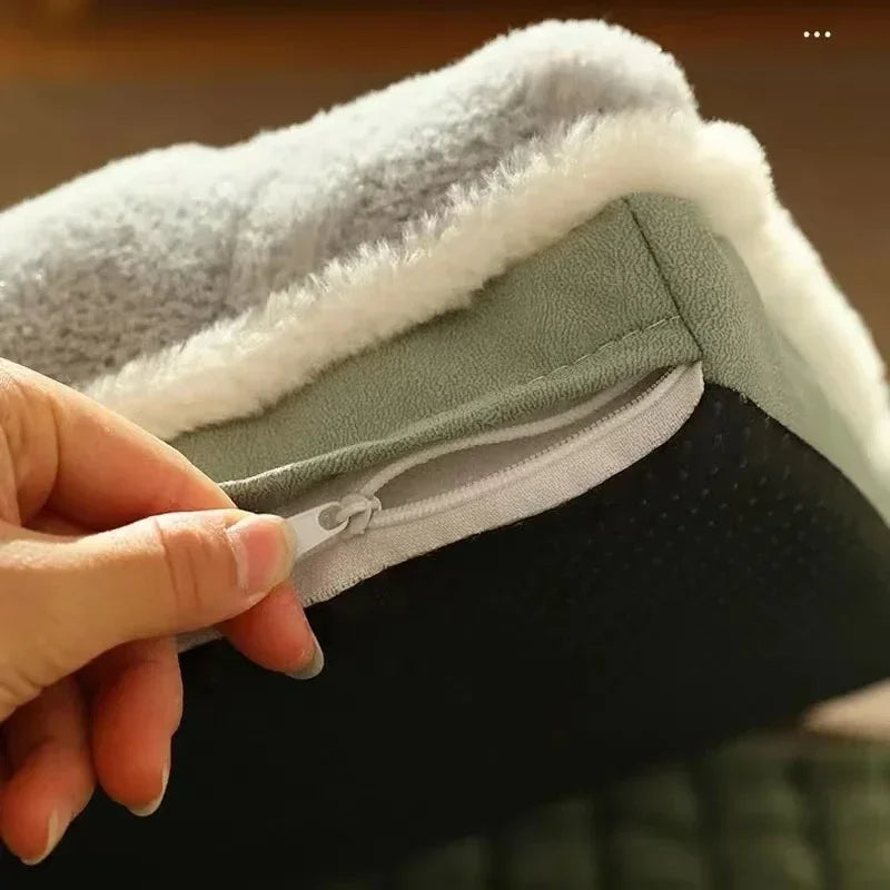 Close-up of a hand holding a green fabric with white lining