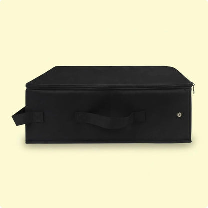 Black storage box with a handle on a beige background