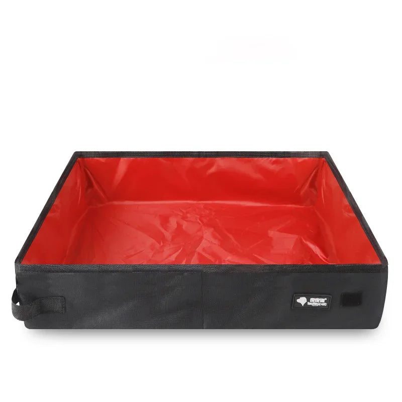 Black storage bin with red interior on a white background