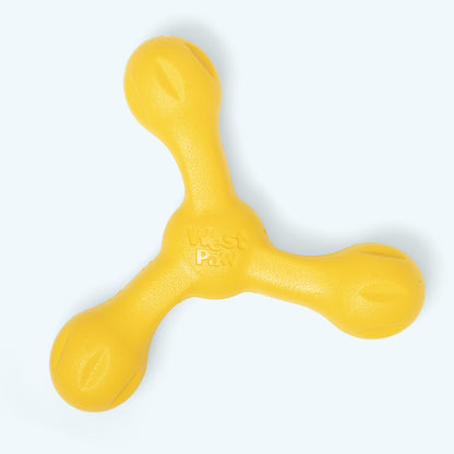Yellow dog toy on a white background
