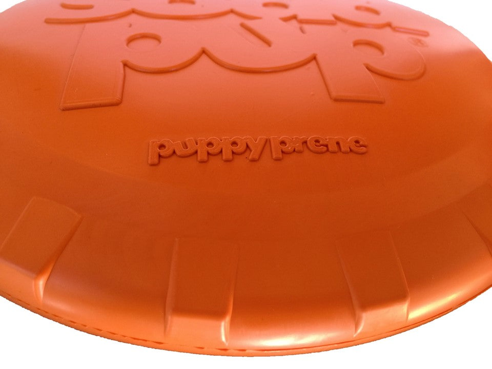 Orange dog toy with 'Puppy Prene' branding on a white background