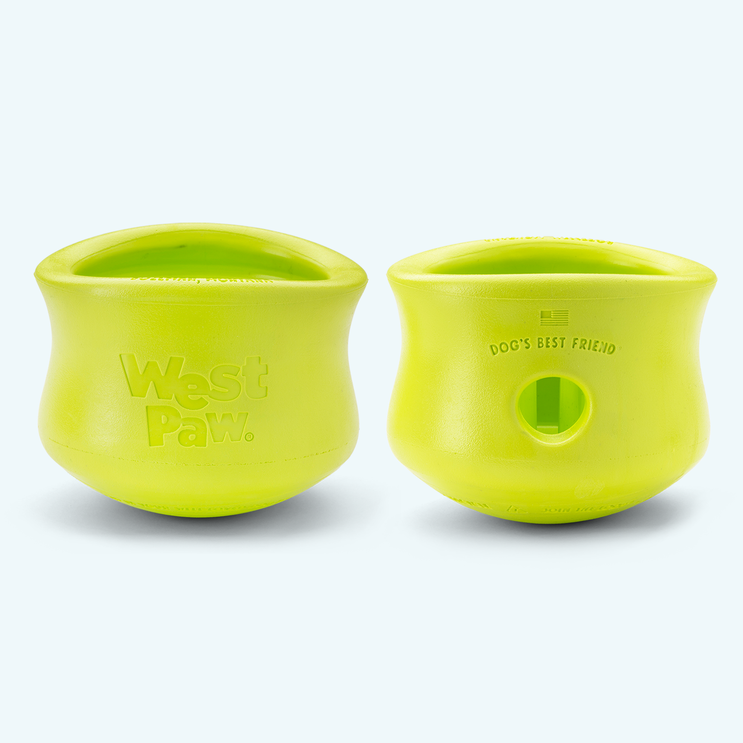 Two green pet toys with 'West Paw' branding on a white background