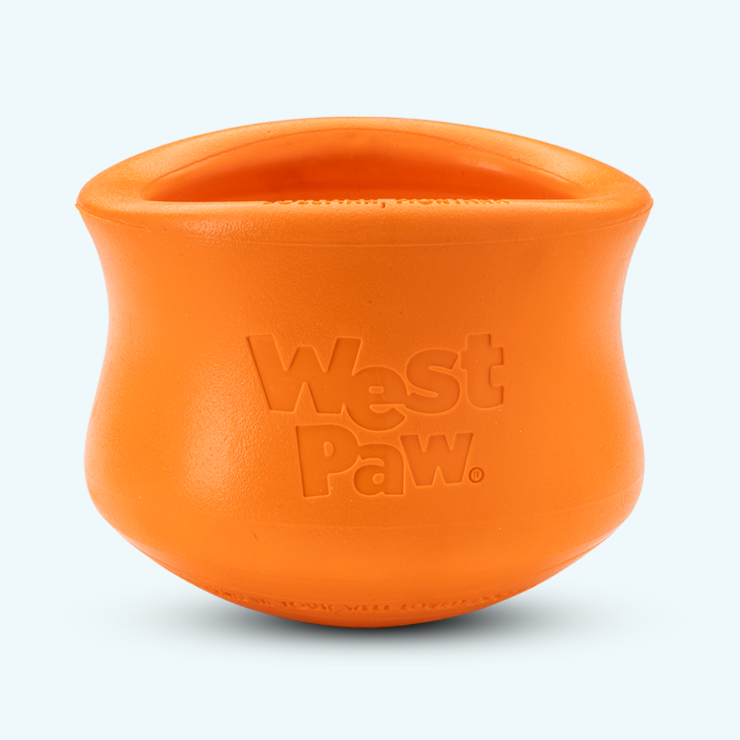 Orange dog toy with 'West Paw' branding on a white background