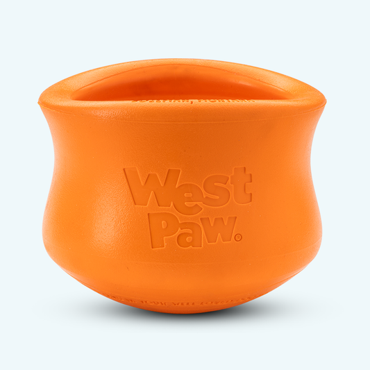 Orange dog toy with 'West Paw' branding on a white background