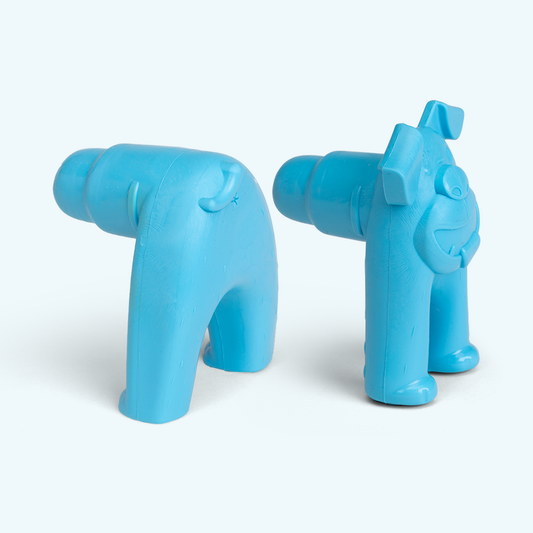 Two blue plastic toys resembling animals on a white background