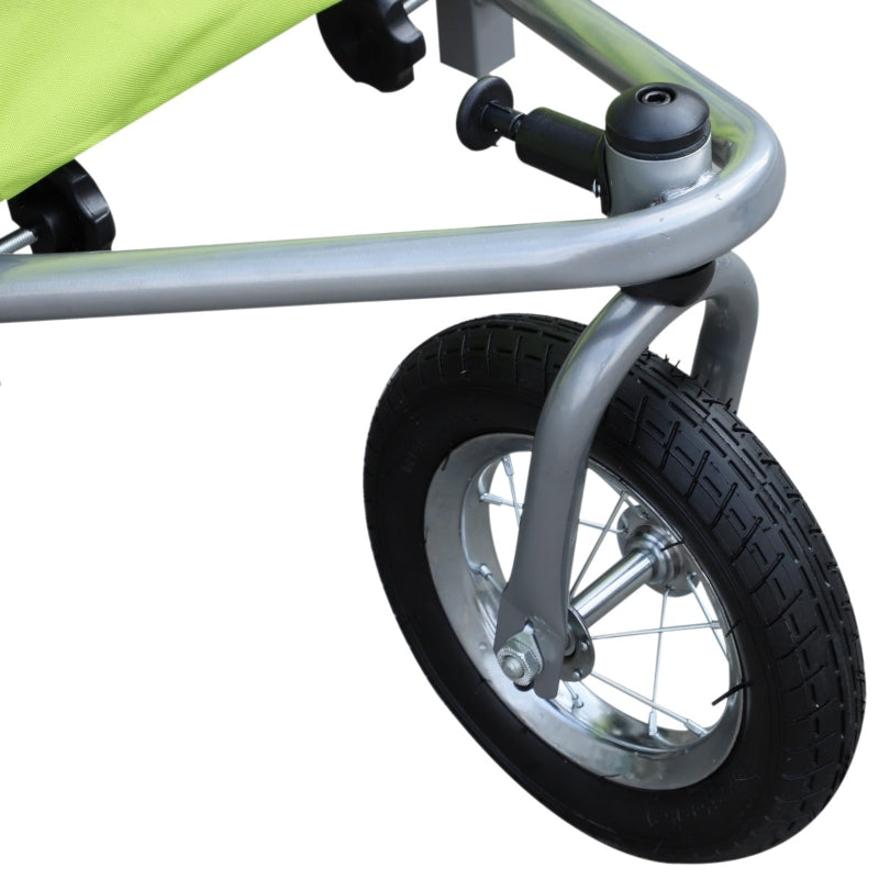 Close-up of a wheel and suspension system on a green stroller.