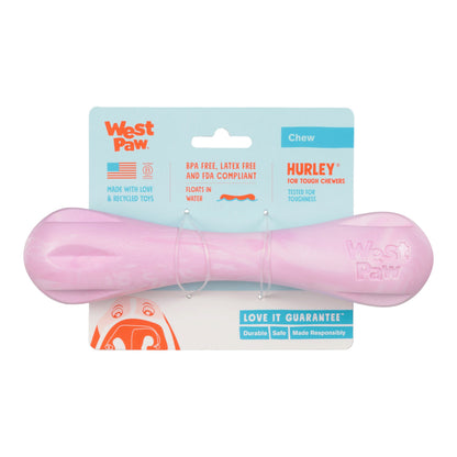 Pink dog chew toy with West Paw packaging on a white background