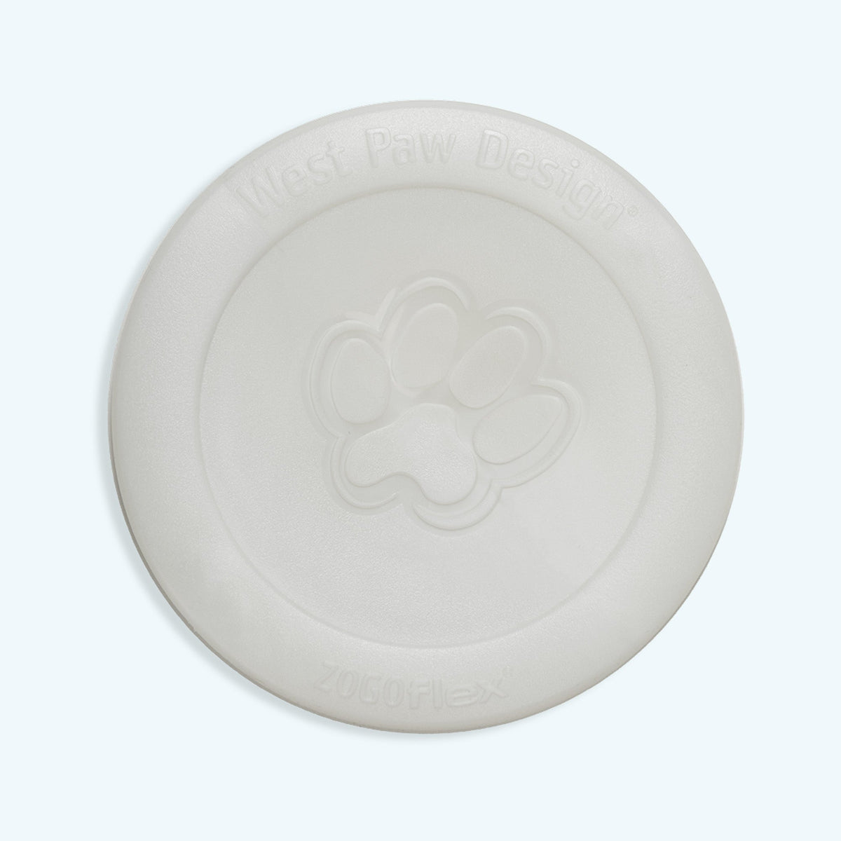 White ceramic plate with embossed design on a light gray background