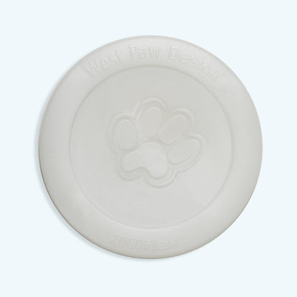 White ceramic plate with embossed design on a light gray background