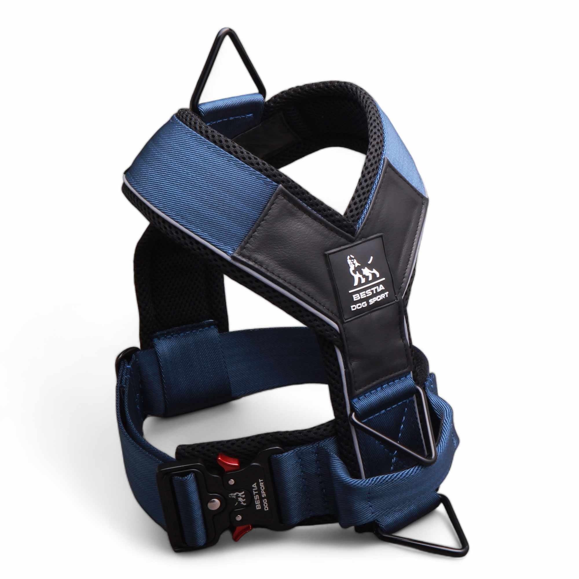 Blue and black dog harness on a white background