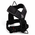 Black dog harness with visible brand logo on a white background