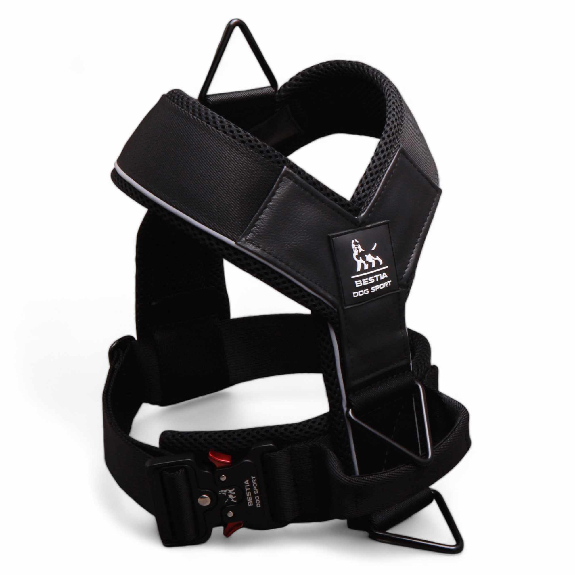Black dog harness with visible brand logo on a white background