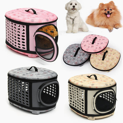 Pet carrier with floral design, shown with two small dogs on a white background.