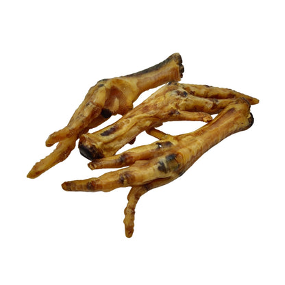 A handful of crunchy chicken feet treats from the 20 pack for dogs
