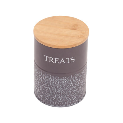 Bamboo lid lifted from a carbon steel dog treat canister in volcanic gray