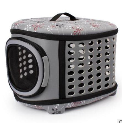 Gray pet carrier with floral pattern on a white background