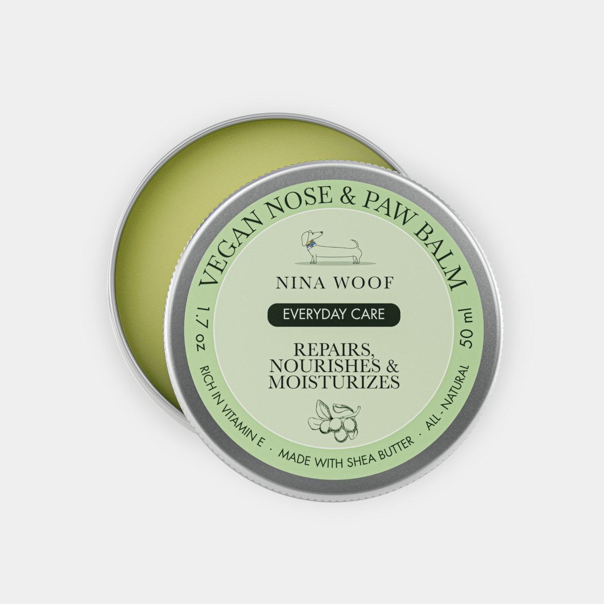 Nina Woof Vegan Nose & Paw Balm container on a light gray background