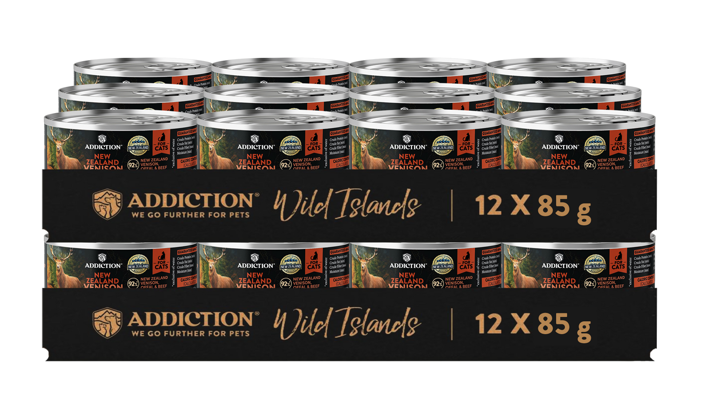 Multiple cans of Addiction Wild Islands pet food packaging on a white background