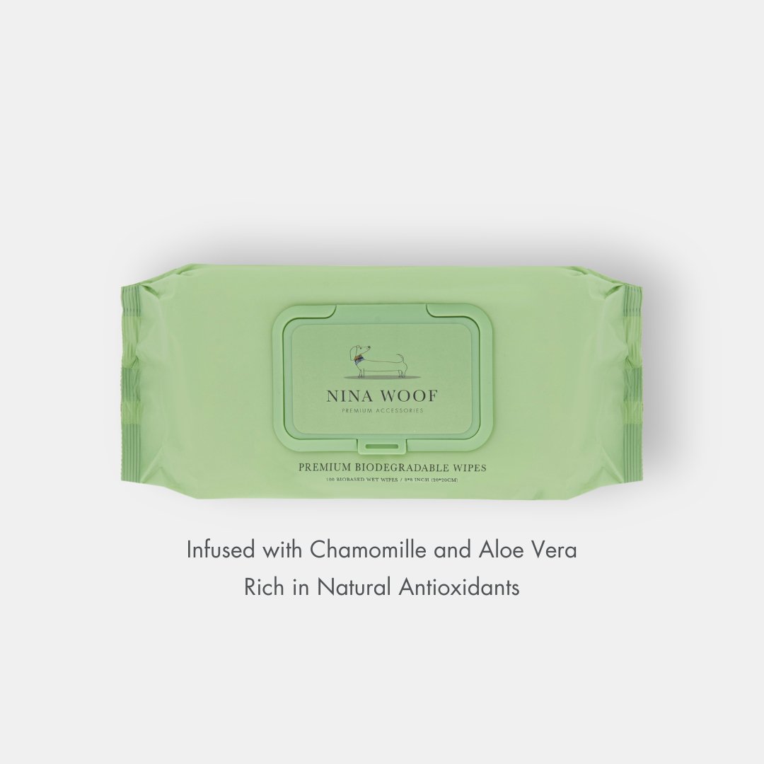 Green package of Nina Woof wipes on a white background