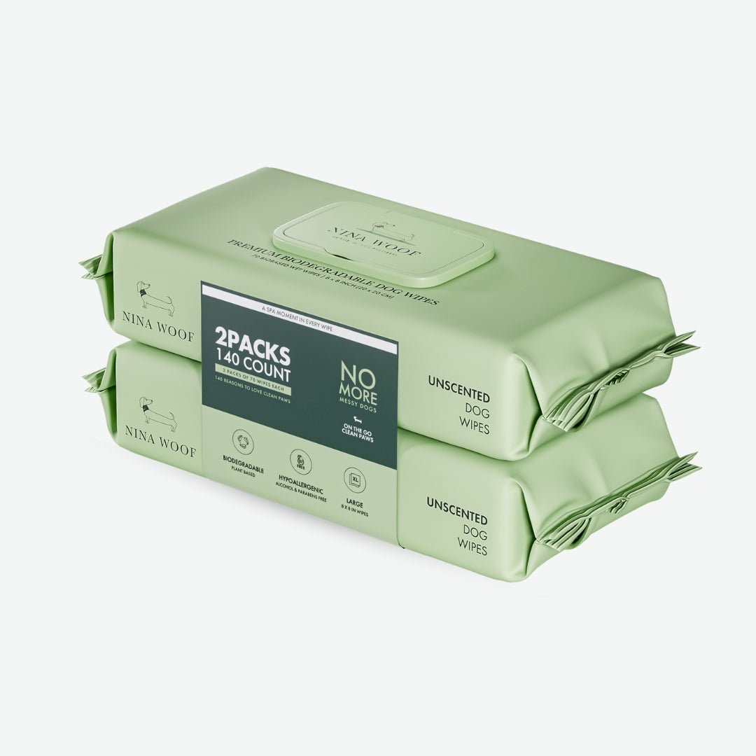 Two packages of Nina Woof dog wipes on a white background
