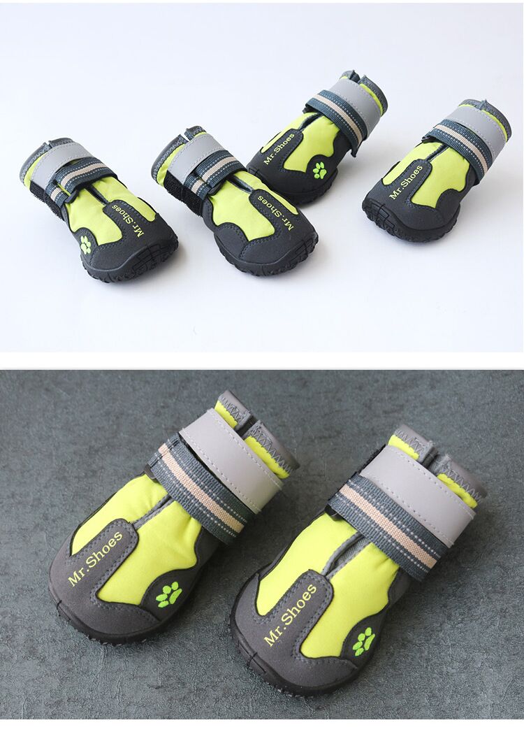 Set of dog boots with yellow and gray color scheme on a white and gray background