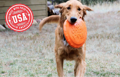 Dog running with an orange frisbee in its mouth, with a 'Made with Pride in America' USA stamp in the corner.